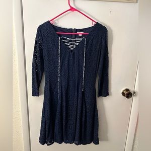 Women’s Blue dress with lace up detail.